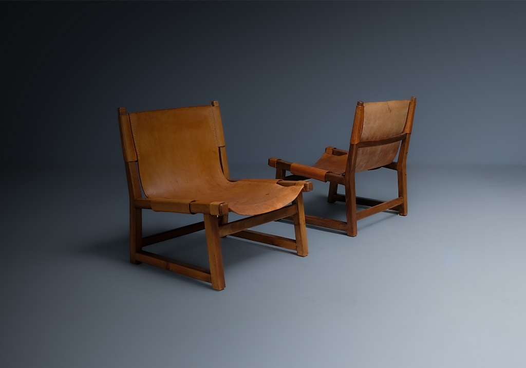 Fauteuils Riaza: vue d'ensemble des chaises dans une rangée, les deux faisant face à des directions opposées
