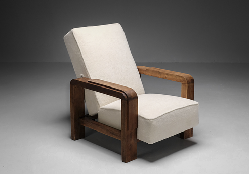 Frontal view of Jacques Adnet 1928 lounge chair