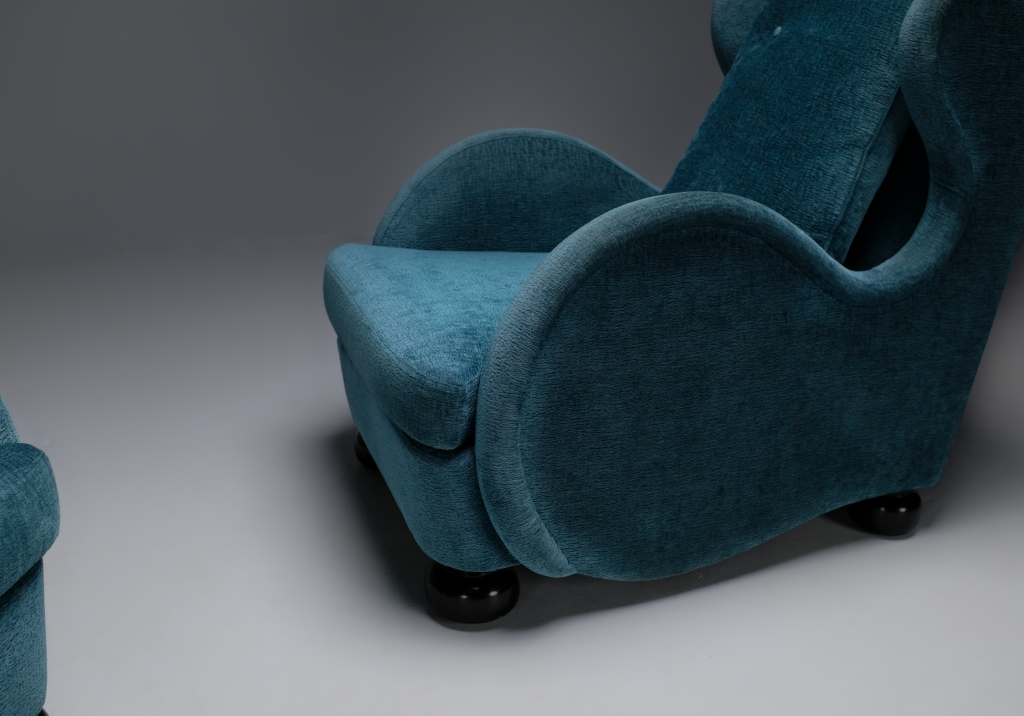 Pair of Armchairs by René Drouet: Detail of one of the round armrests and the feet in the form of slightly flattened balls