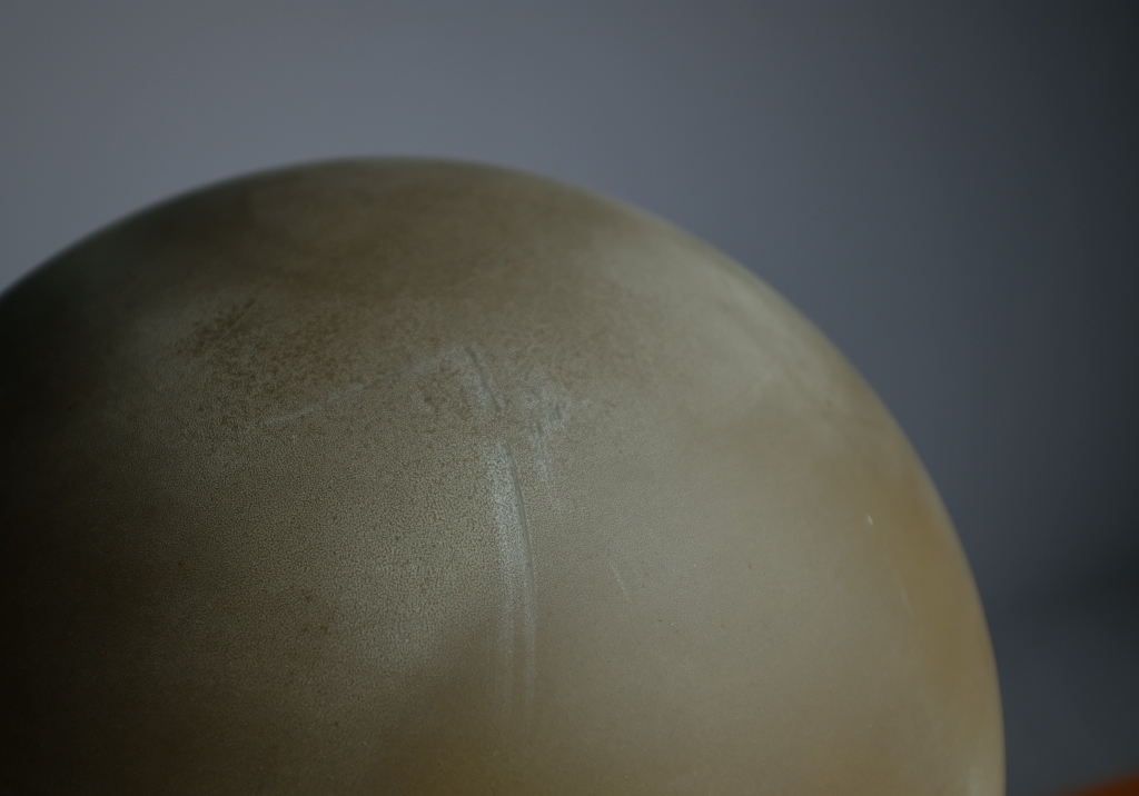 Atollo Lamp: close up of the patina on the top surface