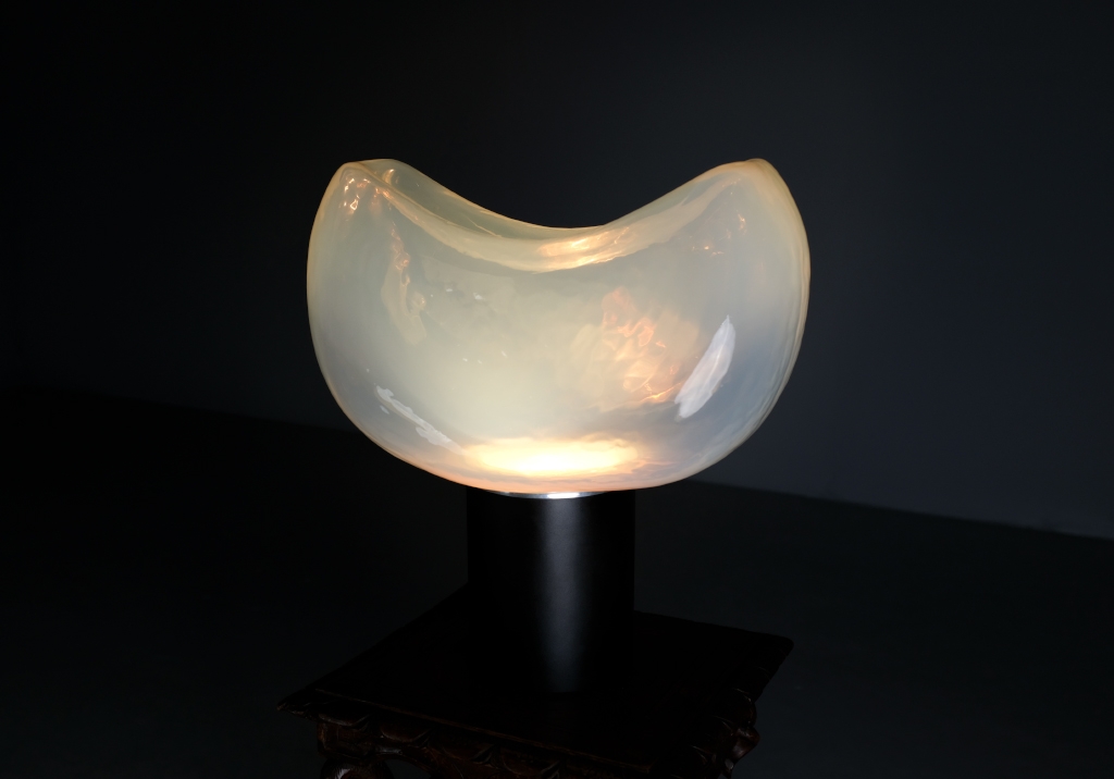 Aghia Lamp: closeup of lamp turned on in the dark