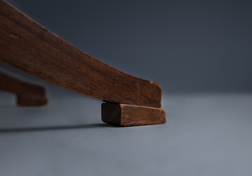 X Stool: detailed view of the base of one of its legs