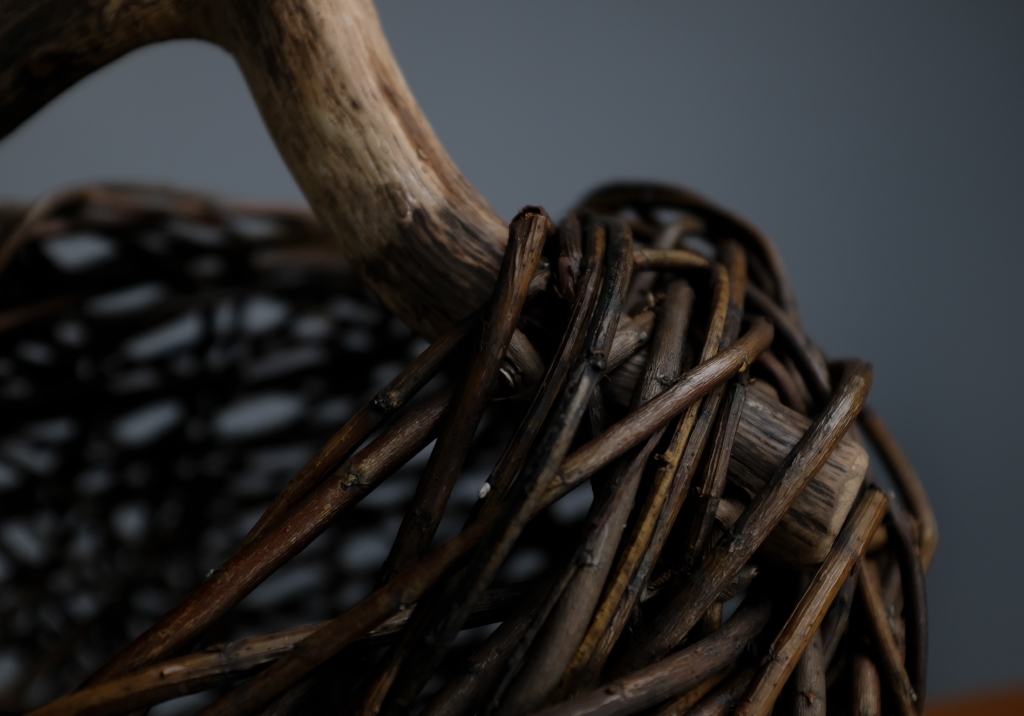 Wicker and Sauvage Oak Basket: detail of raw woven wicker