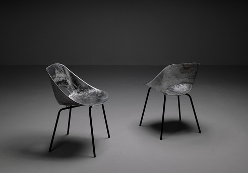 Aluminum chairs by Pierre Guariche: Overview of the chairs, one front the front, the other from the back