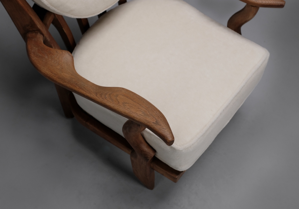 Oak armchair by Guillerme et Chambron: details on the woodwork of the armrests