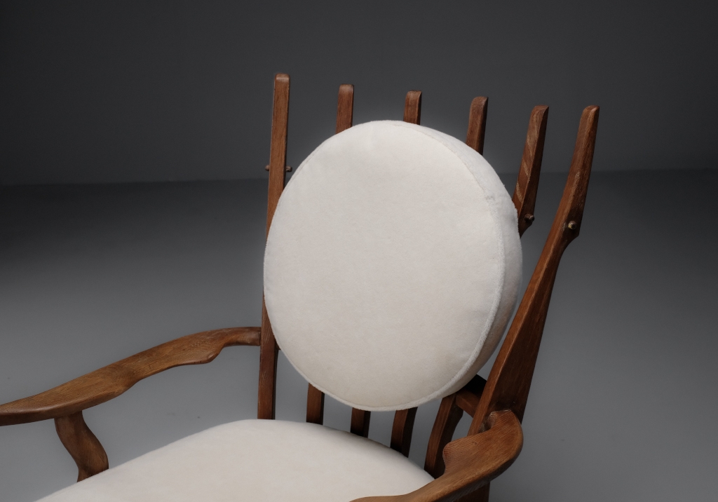 Oak armchair by Guillerme and Chambron: details on the round backrest cushion