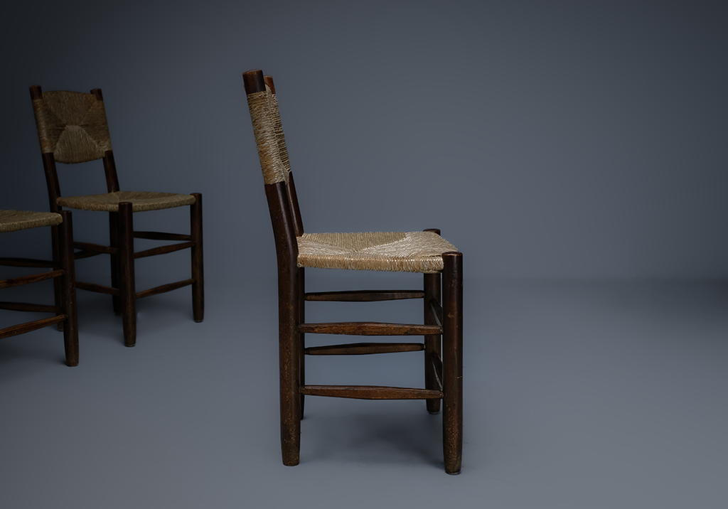 Set of 4 "Bauche" Chairs: side view of a single chair facing right 