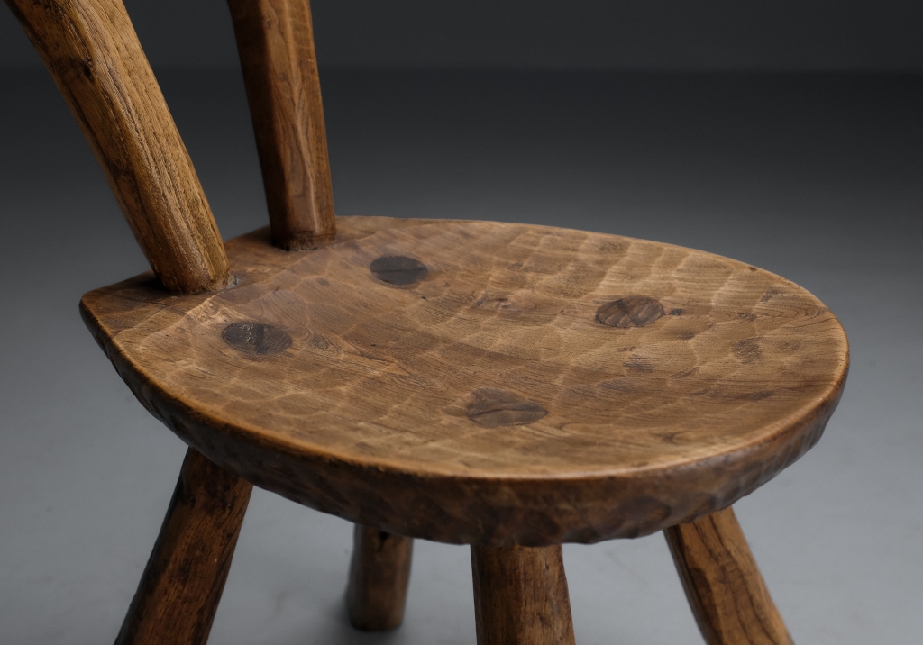 Stool or Small Mountain Chair worked with a gouge, details on the seat