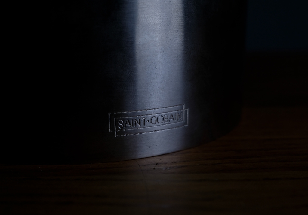 Lamp by Max Ingrand: detail of the Saint-Gobain brand on the cylindrical base of the lamp